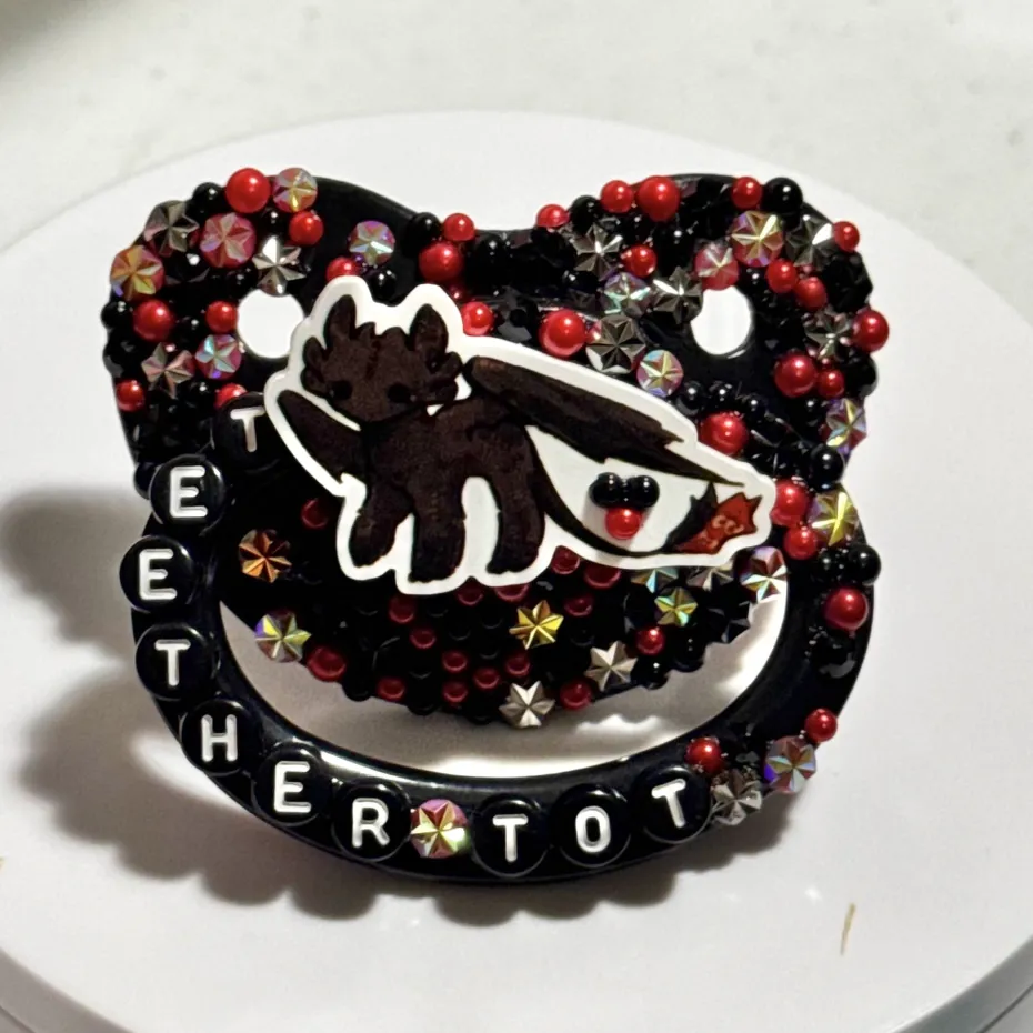 "Teether Tot" Toothless Paci