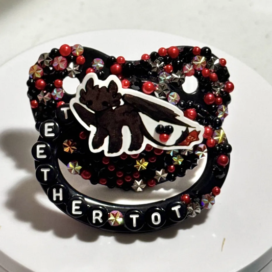 "Teether Tot" Toothless Paci